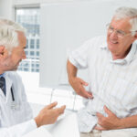Doctor consulting patient about digestive health at Vanguard Gastroenterology