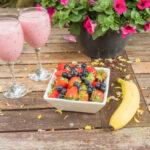 Glass of grape juice with foods for acid reflux relief