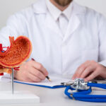 Patient consulting with Vanguard Gastroenterology doctor about gas-causing foods